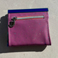 Purple mauve sparkle vinyl pouch with a silver zipper and charm