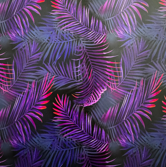 Neon palm leaf pattern on a dark background