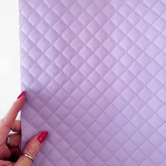 Lavender quilted vinyl fabric with stitched diamond pattern for bag making and sewing projects