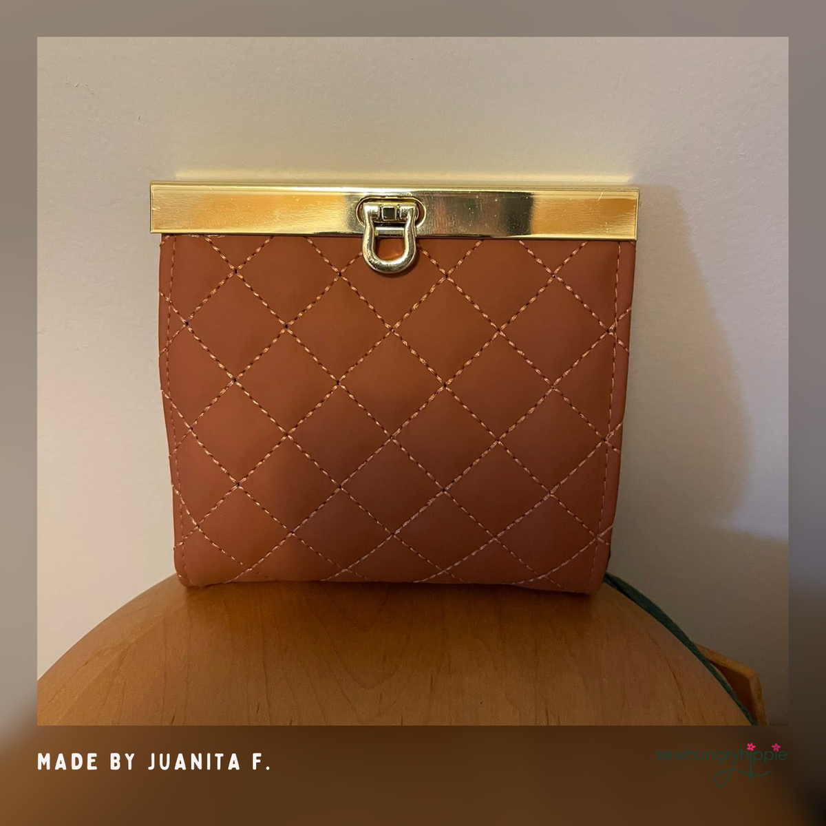 Cinnamon quilted vinyl frame purse with a gold clasp
