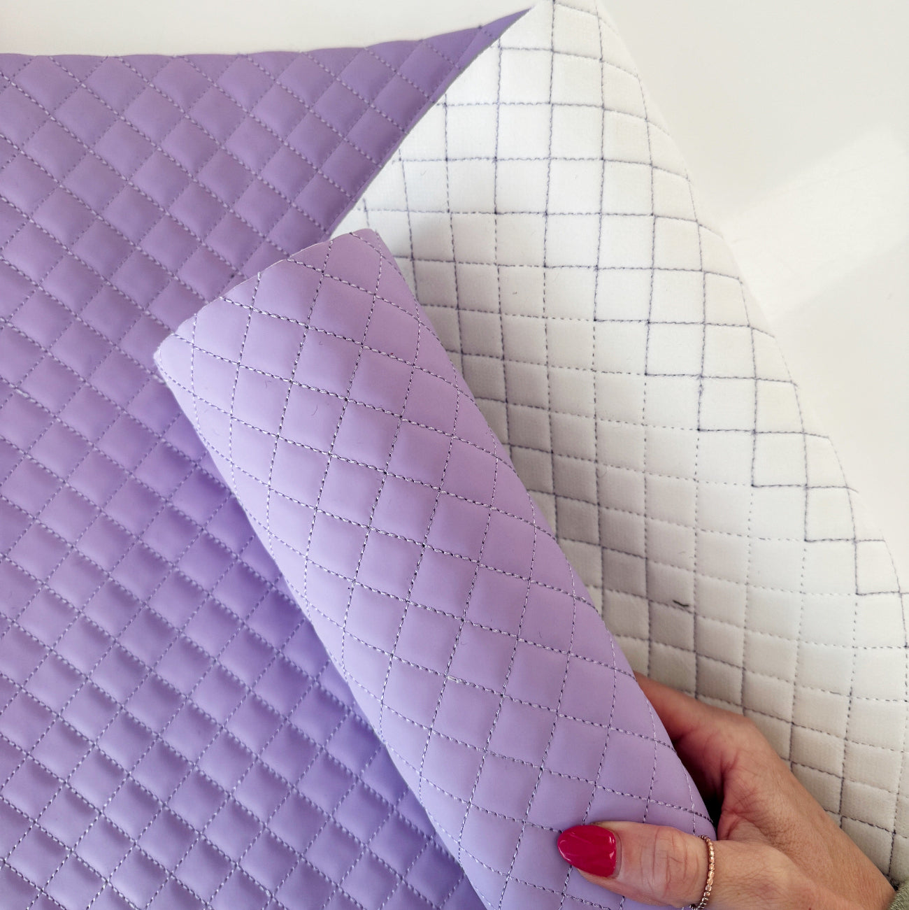 Soft lavender quilted vinyl fabric roll with diamond quilting pattern for bag making