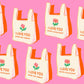 Have a nice day flamingo pink quilting cotton fabric with retro shopping bag illustrations from Sparkle Mart by Melody Miller