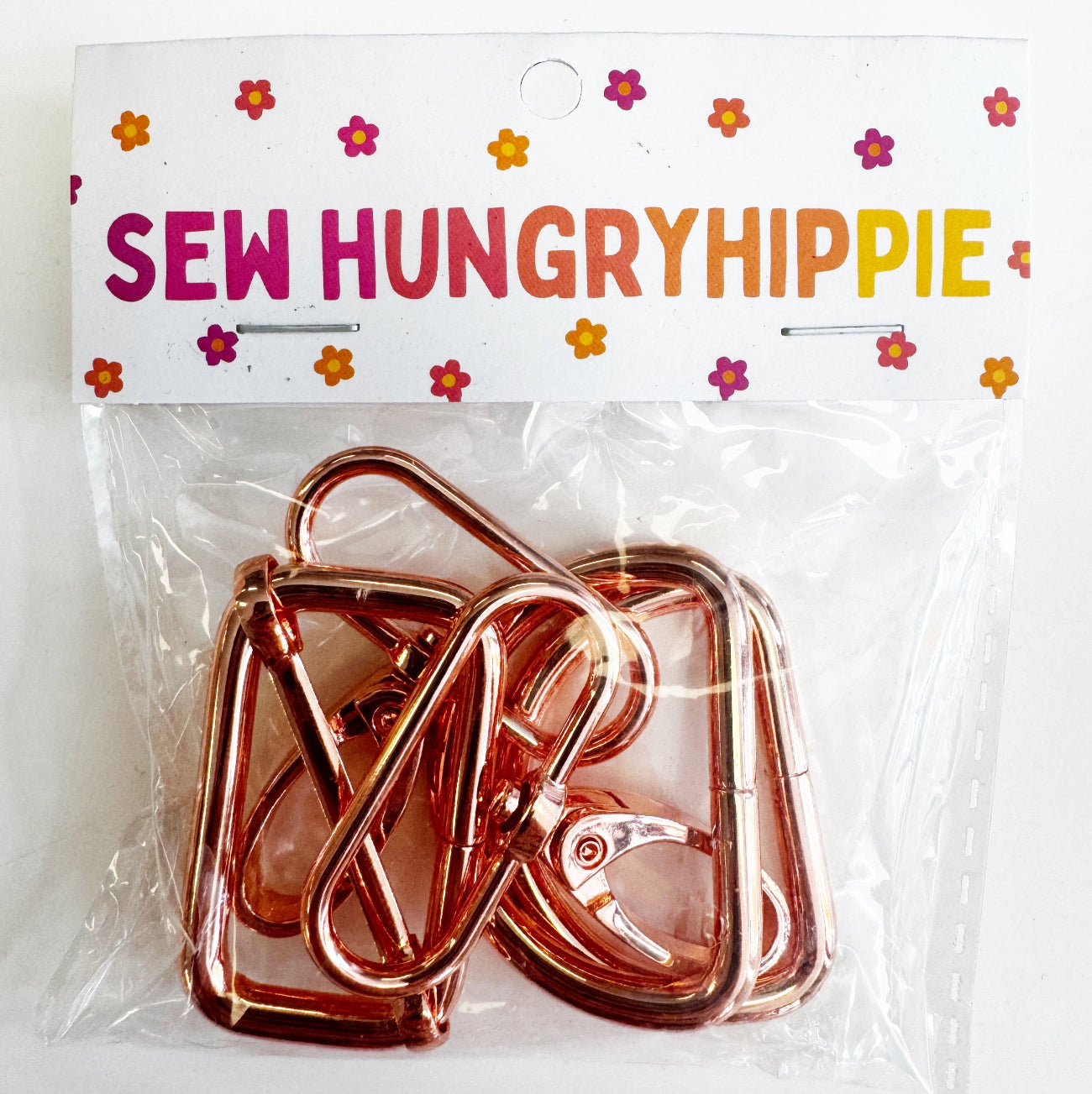 Rose gold 1.5-inch width, 5-piece hardware set by Sew HungryHippie in plastic packaging.