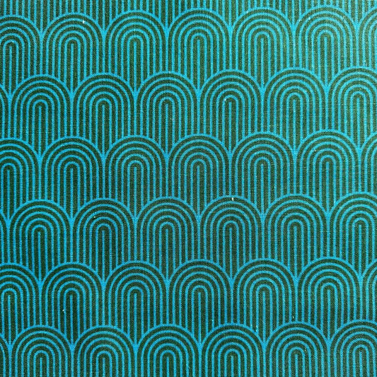 A teal and dark green cotton-linen canvas fabric featuring a repeating Art Deco-inspired pattern of stacked, concentric arches.