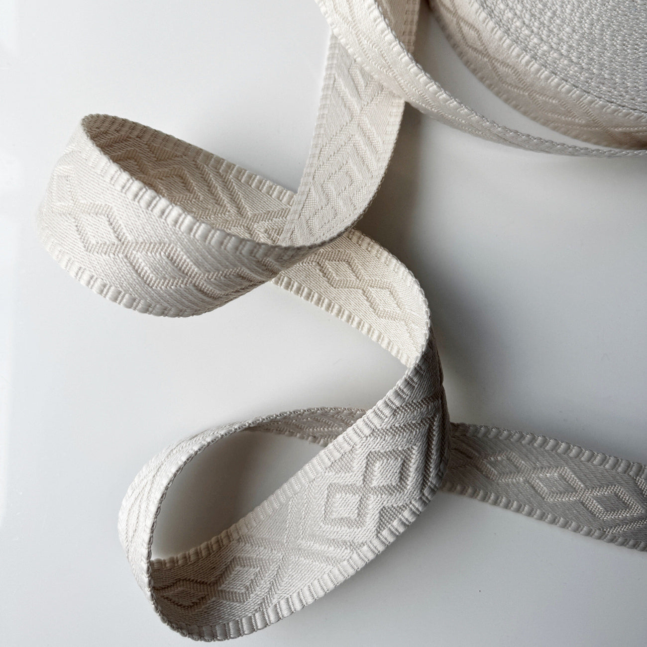 Cream diamond patterned ribbon roll