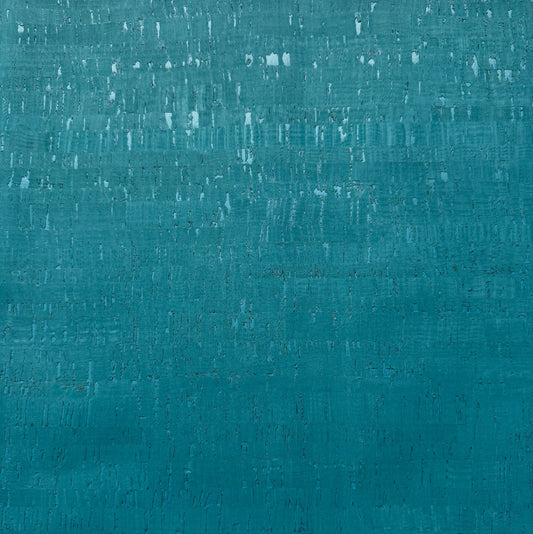 A close-up of a textured teal fabric with subtle horizontal and vertical brush-like striations and small white speckles.