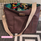 Stevie bag in moonglow vinyl and cream jacquard webbing bag strap
