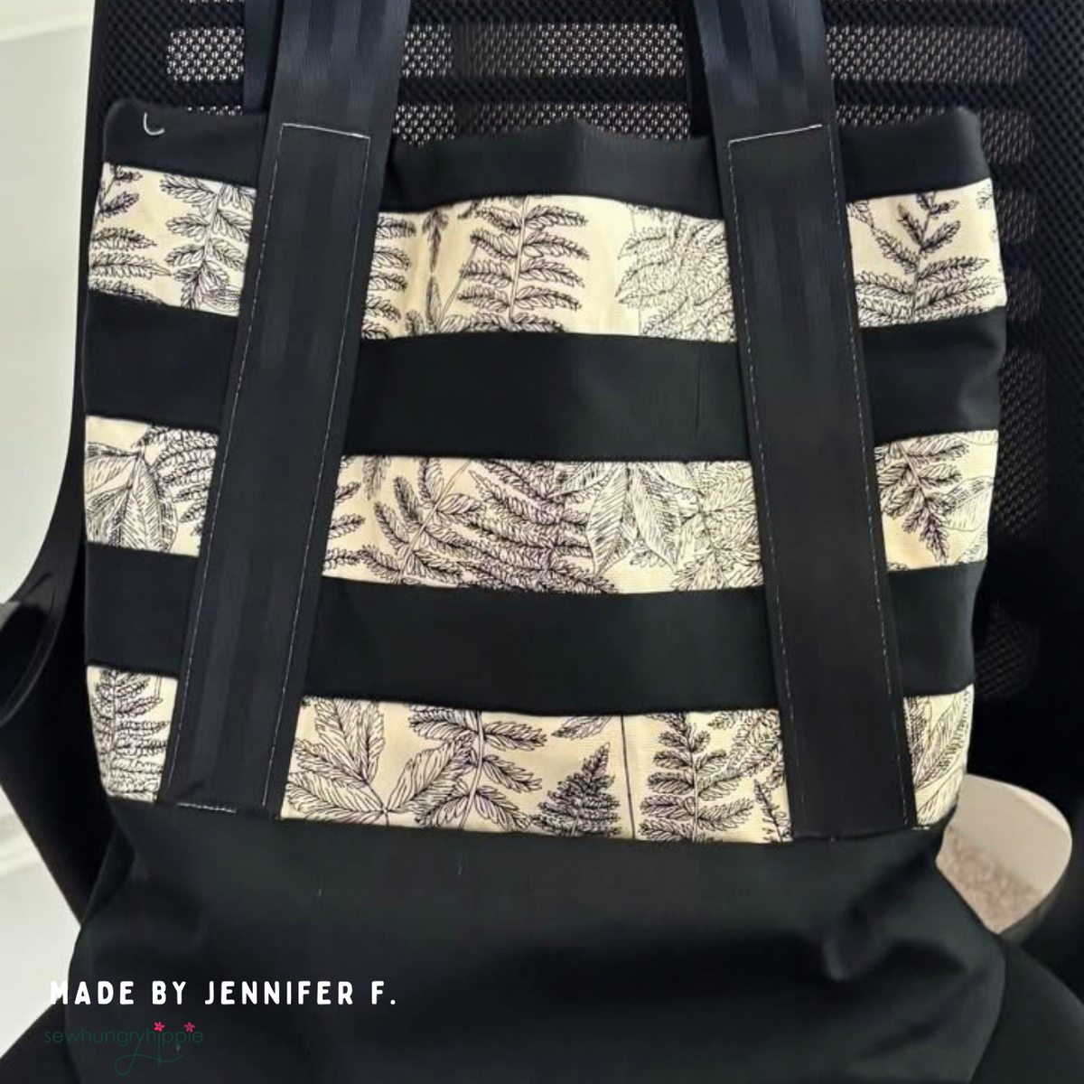 Striped tote in black and cream fern print with black handles