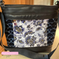 DIY Aspen Crossbody handbag featuring floral classic fabric, black vinyl, and black jacquard webbing professional bag-making finish.