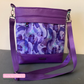 Handmade crossbody bag inspired by the Aspen Crossbody pattern using purple vinyl, or purple abstract vinyl for a perfect combination.