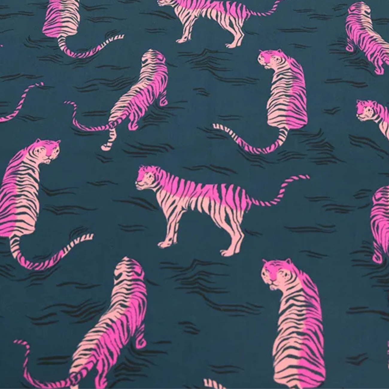 Close-up detail of pink tiger animal print fabric on dark teal cotton, showcasing bold striped tiger illustrations, fine fabric texture, and modern retro design perfect for quilting, fashion sewing, accessories, and handmade crafts.