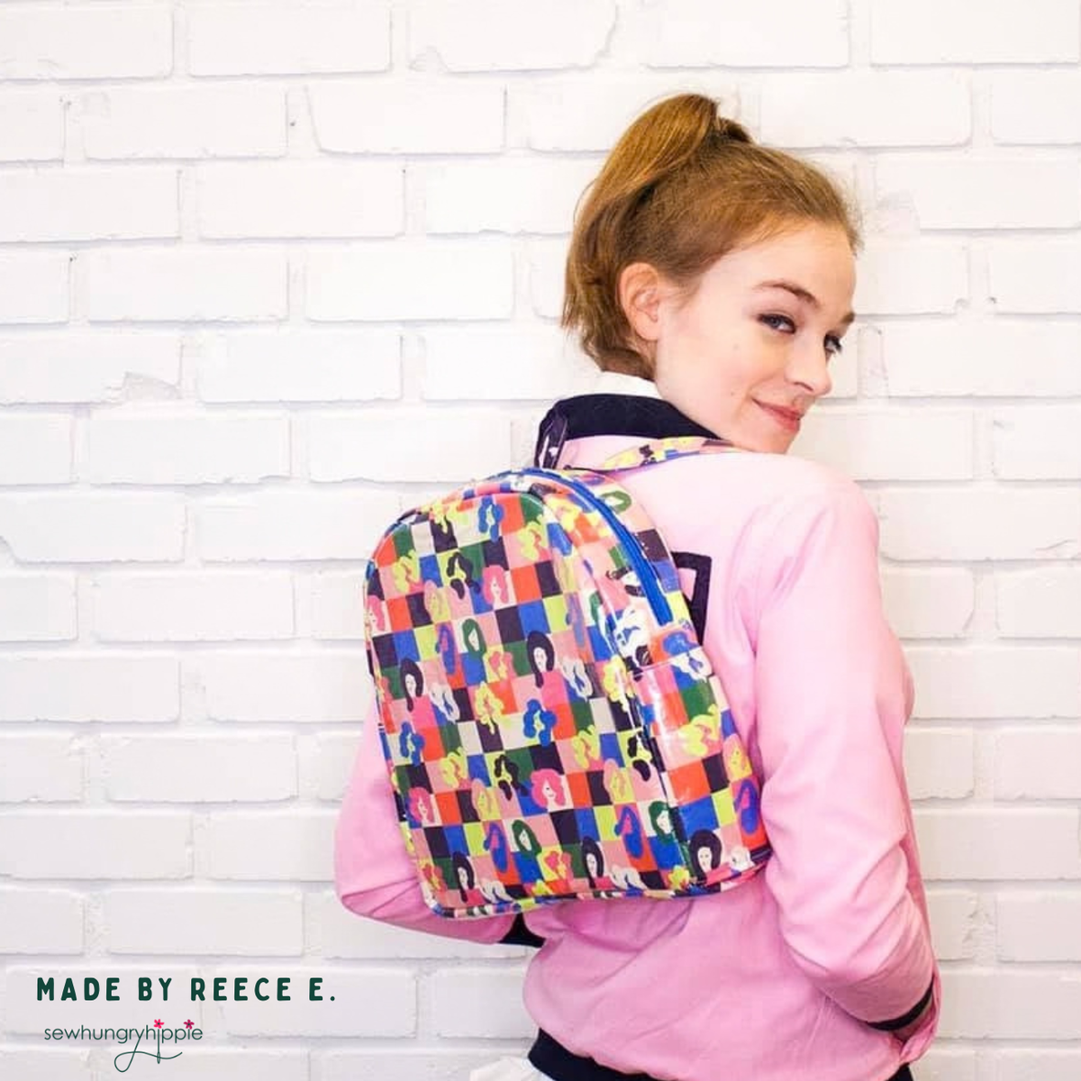 Young woman wearing a small Trina Backpack in colorful geometric print, made by Reece E.