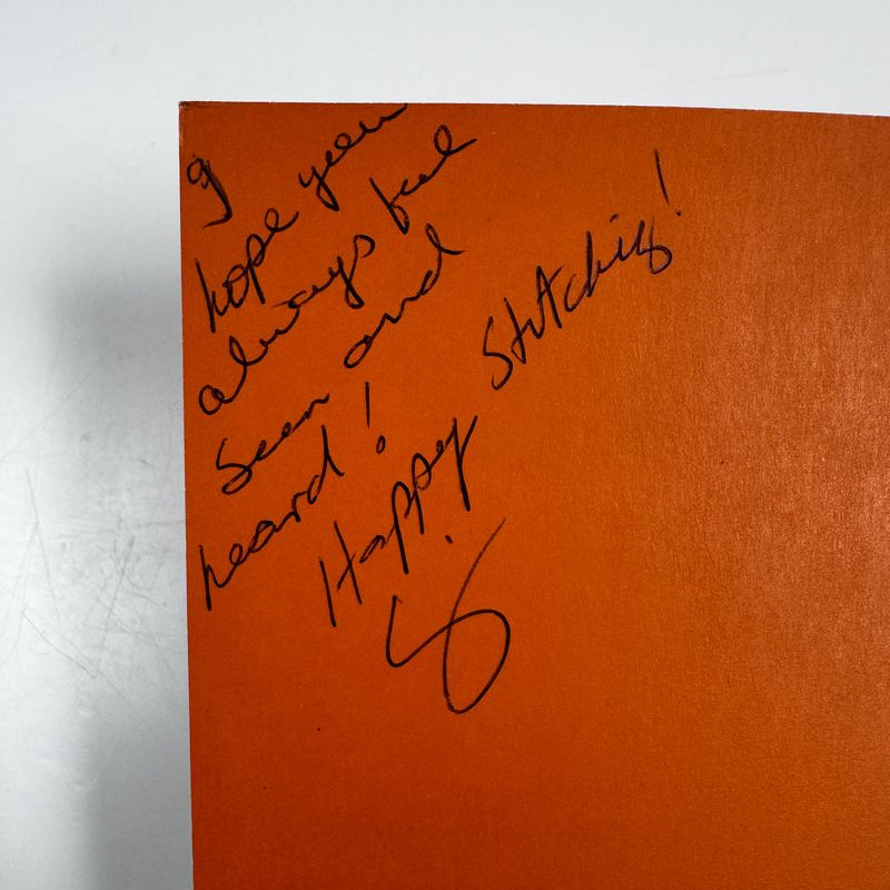 Close-up of the inside cover with a signed message: "I hope you always feel seen and heard! Happy Stitching!