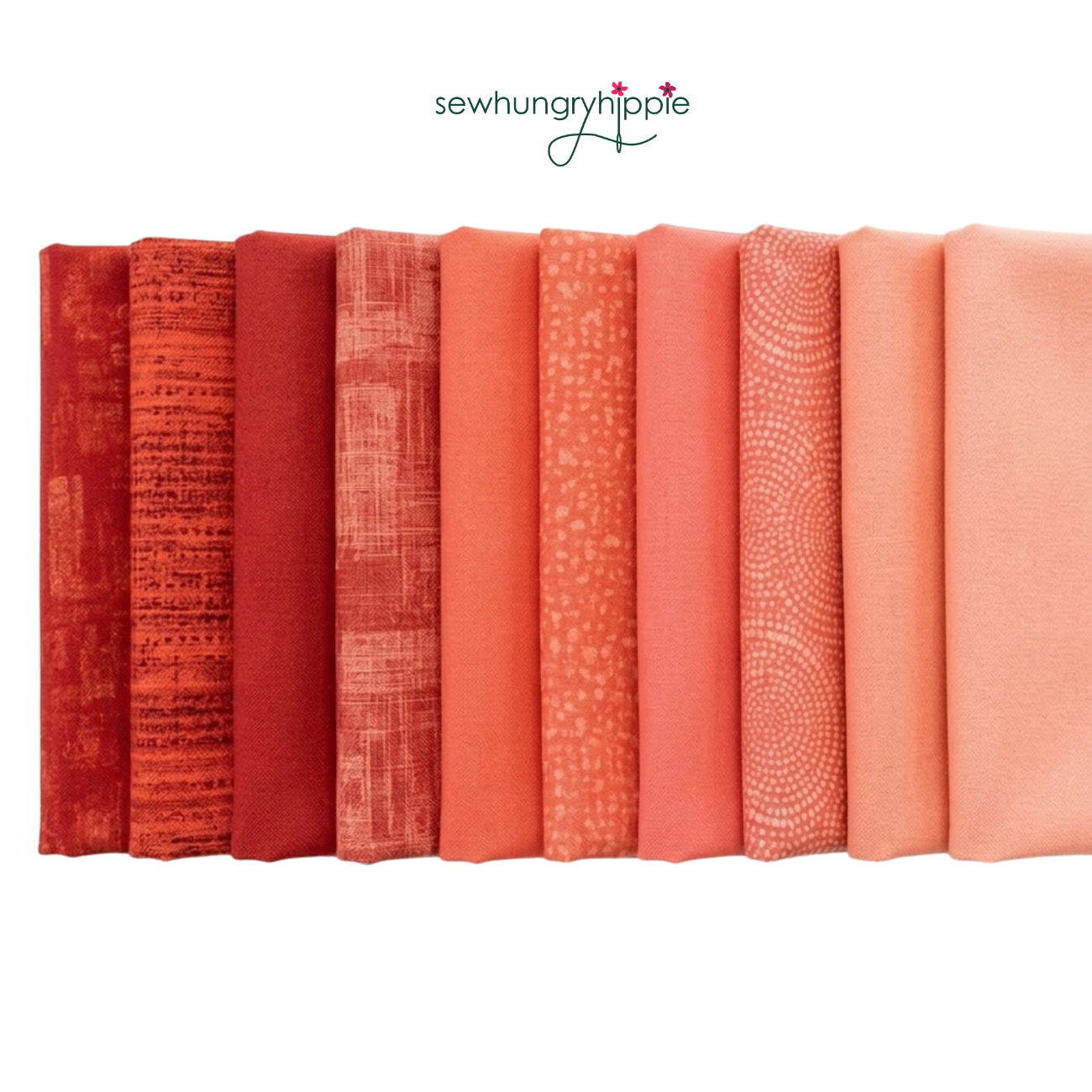 Peach and coral toned quilting cotton fabric from Color Me collection by Windham Fabrics
