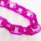 Pink chain on a white background