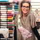 Woman with floral adventure sling bag