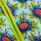 Aqua sea anemone floral cotton fabric paired with a lime green zipper for sewing projects