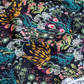 Meadow Umbra cotton flannel, a folk floral on a dark background