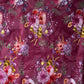 Floral pattern with various flowers on a red background