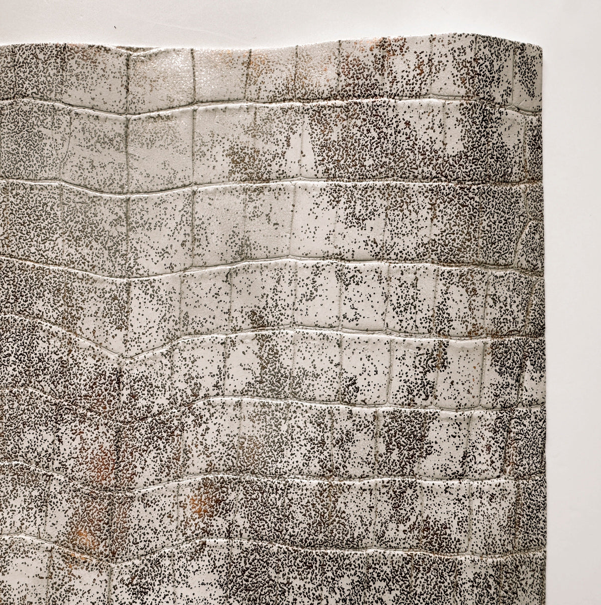 Textured vinyl with horizontal lines and speckled pattern