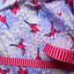 Birds of a Feather Galahs fabric in lavender by Helen Godden for FreeSpirit Fabrics, featuring vibrant pink galahs in flight with colorful textured polka dots