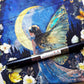 Blue fairy fabric panel with winged woman, crescent moon, flowers and butterflies paired with black soft vinyl for bag making.