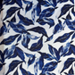White cotton fabric featuring watercolor blue leaf print for sewing handbags, totes, wallets, and handmade accessories.