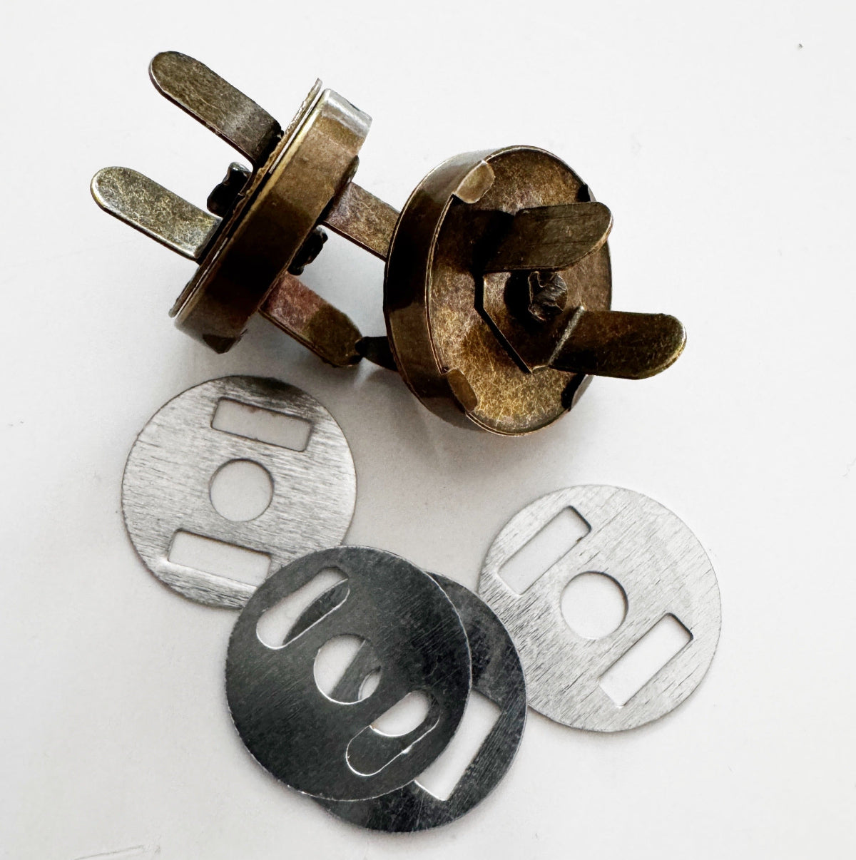 Metal components on a white background