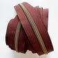 Brown zipper on a white background
