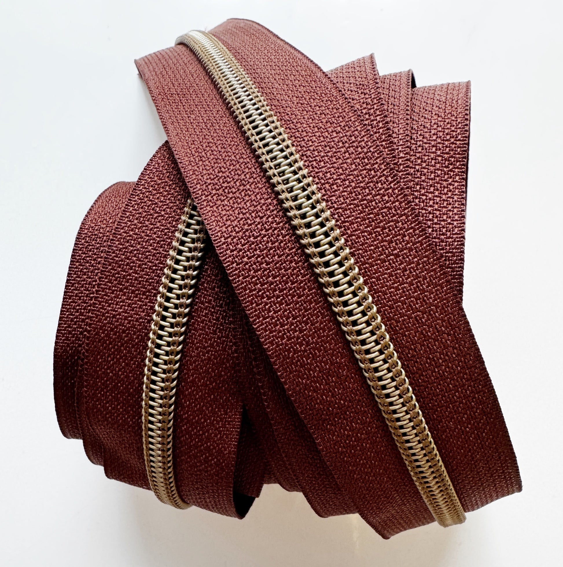 Brown zipper on a white background