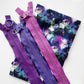Folded Brushstroke Bonded Nylon fabric for bag making paired with chunky zippers in purple, grape purple, and gumdrop