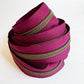 3-yard cut of #5 burgundy nylon zipper tape with antique brass teeth for handbag, purse, wallet, and bag making sewing projects.
