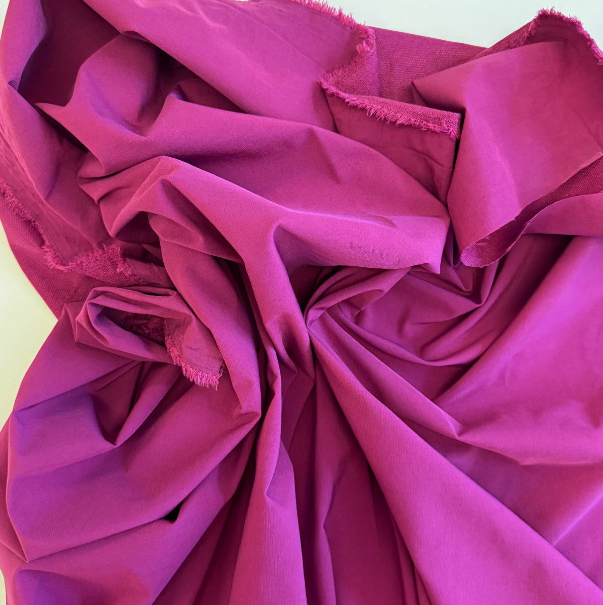 Close-up of purple fabric with folds