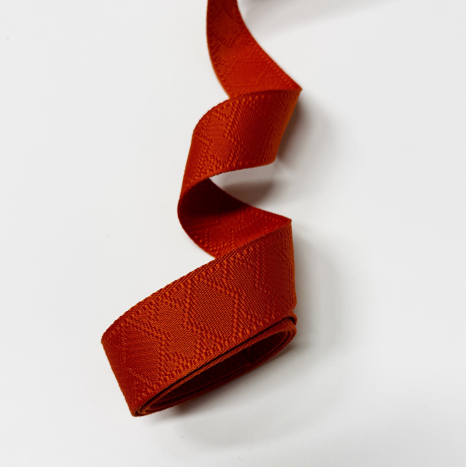 Orange patterned webbing, FD6D8F92-2324-4835-80B3-159945B86315