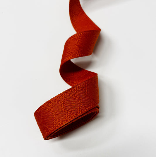 Orange patterned webbing, FD6D8F92-2324-4835-80B3-159945B86315