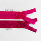 Color comparison of chunky resin zippers with circular ring pulls in bright pink on top and raspberry on the bottom