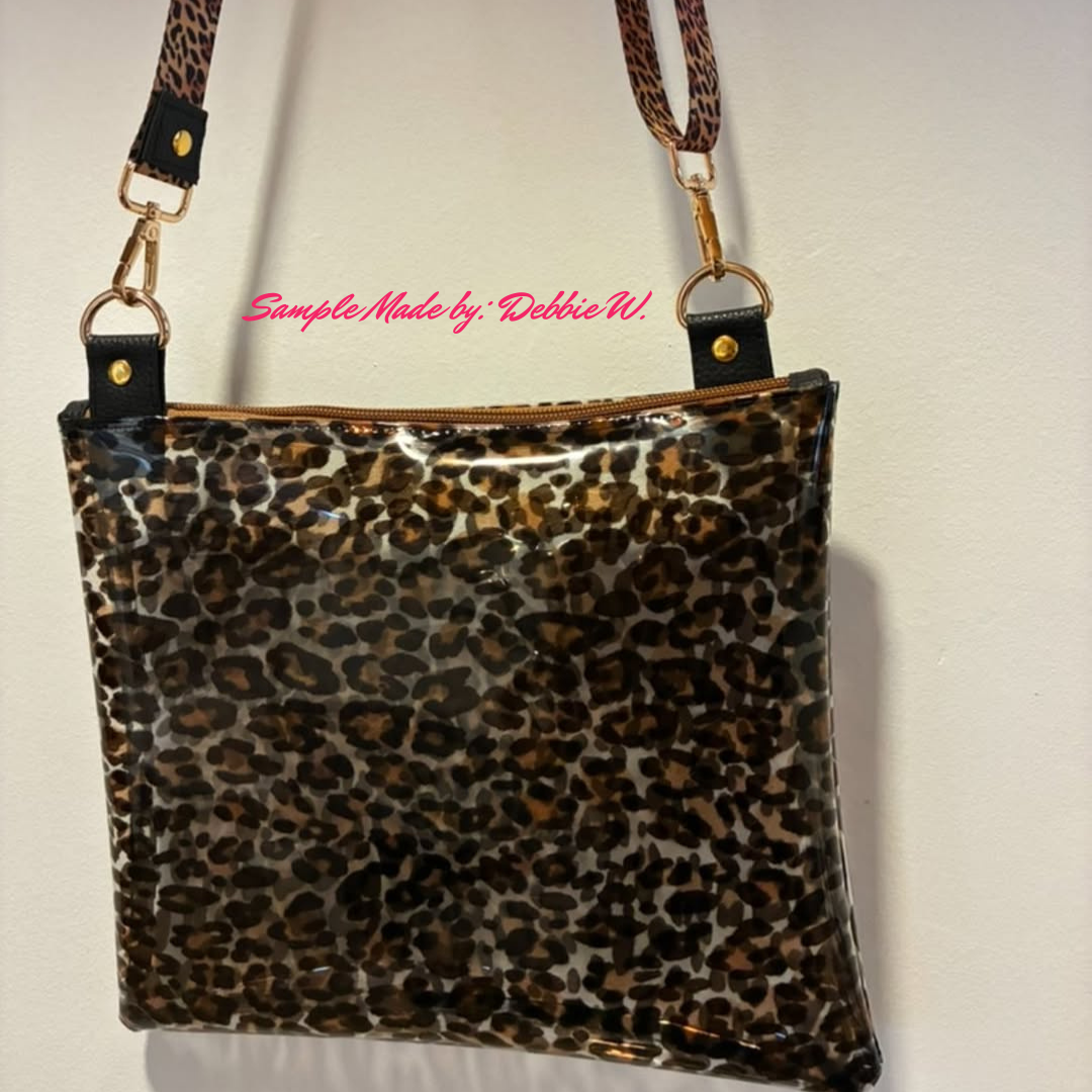 clear vinyl sling bag with leopard print design for fashion accessories