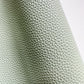 Moonglow New Sage pebbled vinyl faux leather fabric with distinctive grain texture