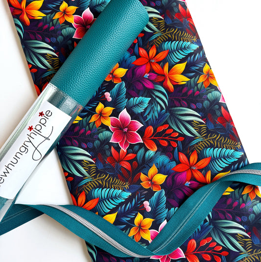 fabric and vinyl with matching zipper on a white background