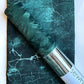 Dark emerald velveteen paired with coordinating black and teal marble cotton fabric, perfect for handbags, wallets, totes, backpacks, home décor, and sewing projects.