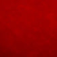Close-up of deep red faux leather material featuring a fine natural grain texture with subtle crimson and burgundy color variations.