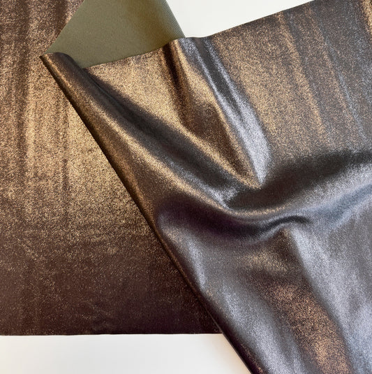 Metallic bronze and pewter fabric sheet with a shiny textured finish