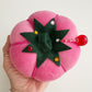 Pink velvet tomato pin cushion by Dritz with decorative rhinestones for sewing, quilting, and crafting