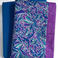 Blue and purple patterned fabric with a plain blue fabric background