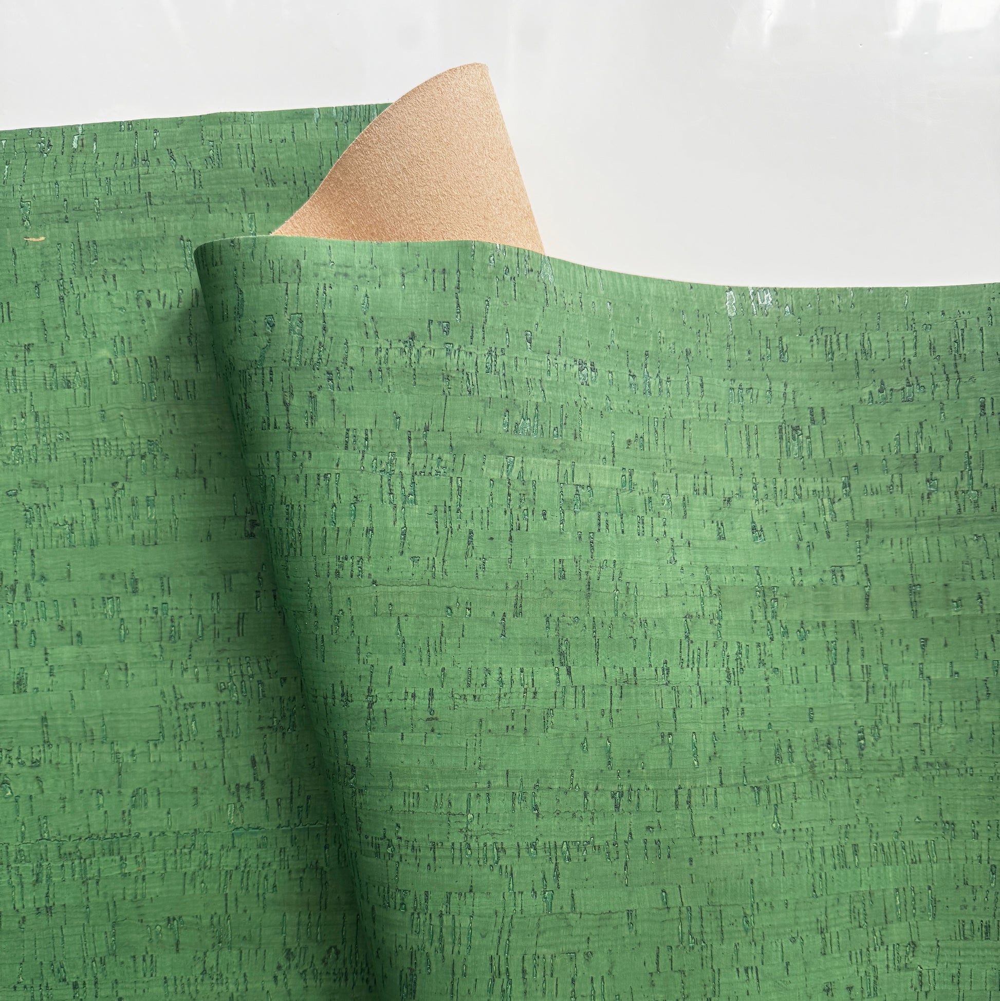 fern green cork fabric roll with natural texture for bag making and sewing projects