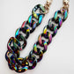 Multicolored chain for bags on a white background