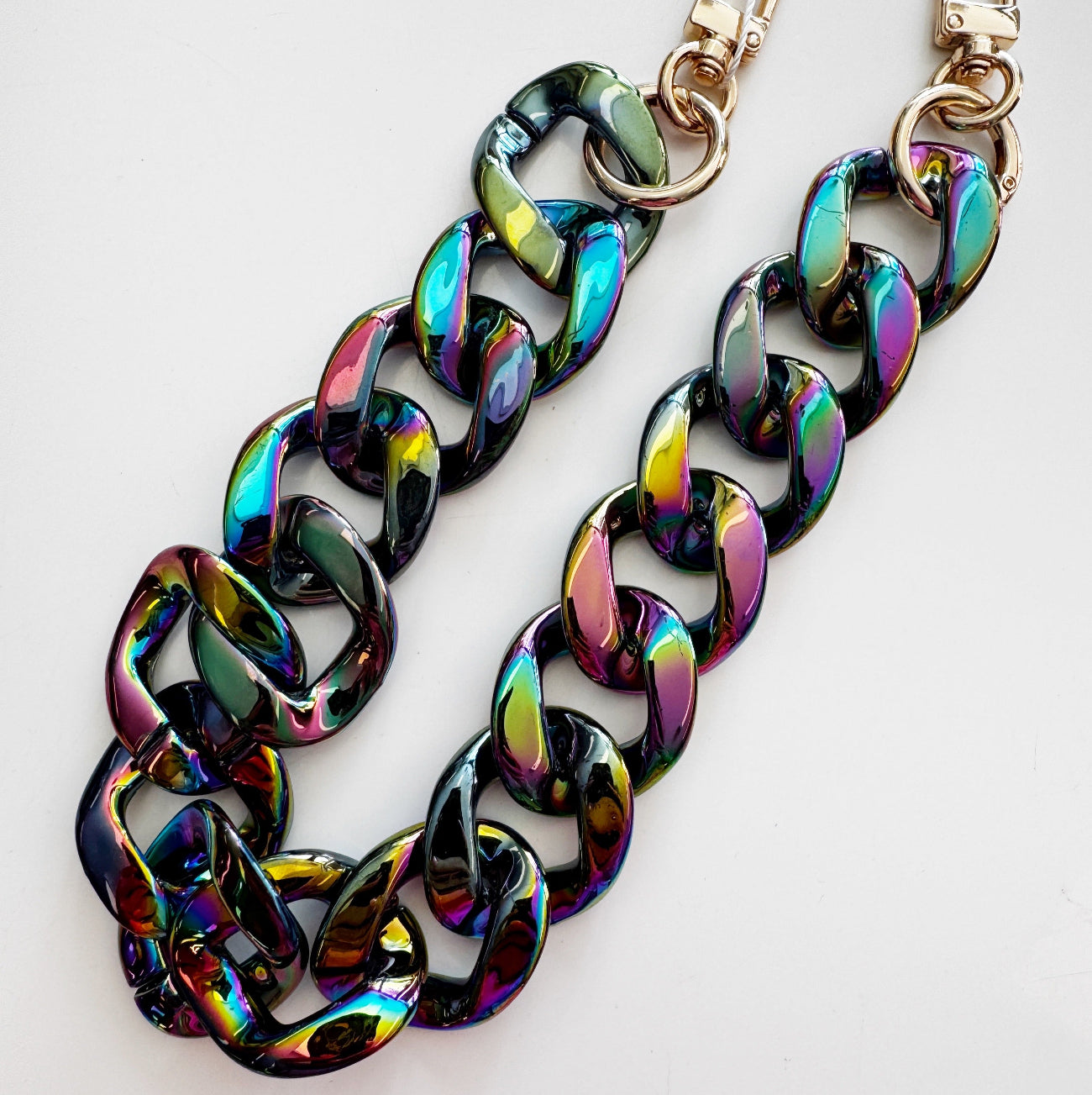 Multicolored chain for bags on a white background