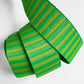 A 1.5-inch wide jacquard woven webbing strap featuring a vibrant green and lime yellow horizontal stripe pattern, neatly coiled against a white background.