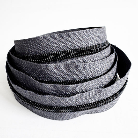 Gray zipper on a white background