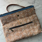 Grier Fold-Over Bag with laser-cut leaf cork fabric and blue denim accent strip